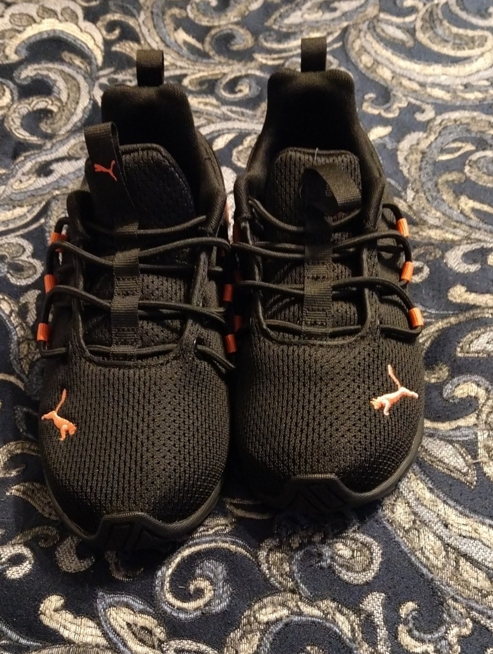 Puma Kids Black Sneakers with Orange Logo Accents